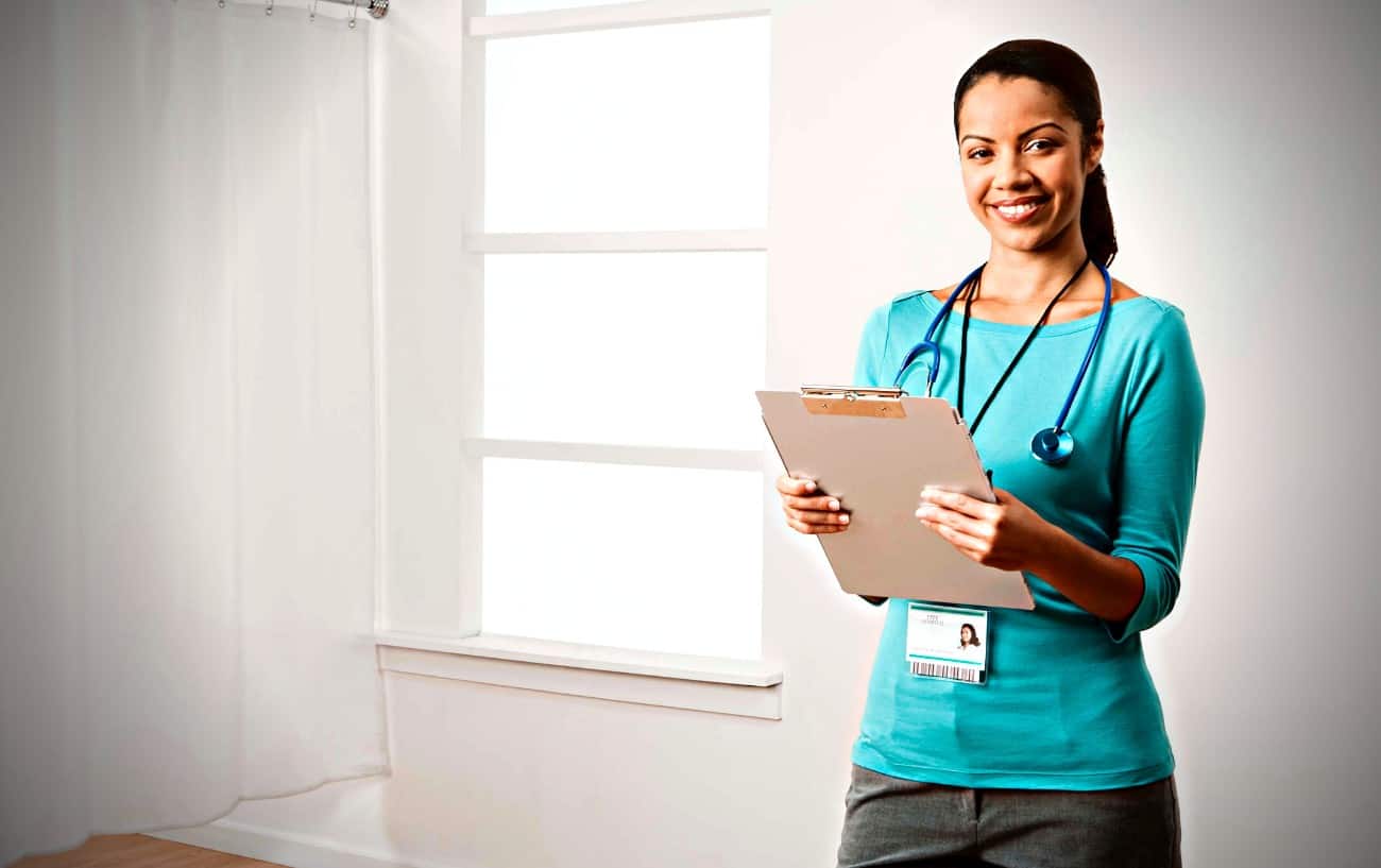 A doctor holding a clipboard.