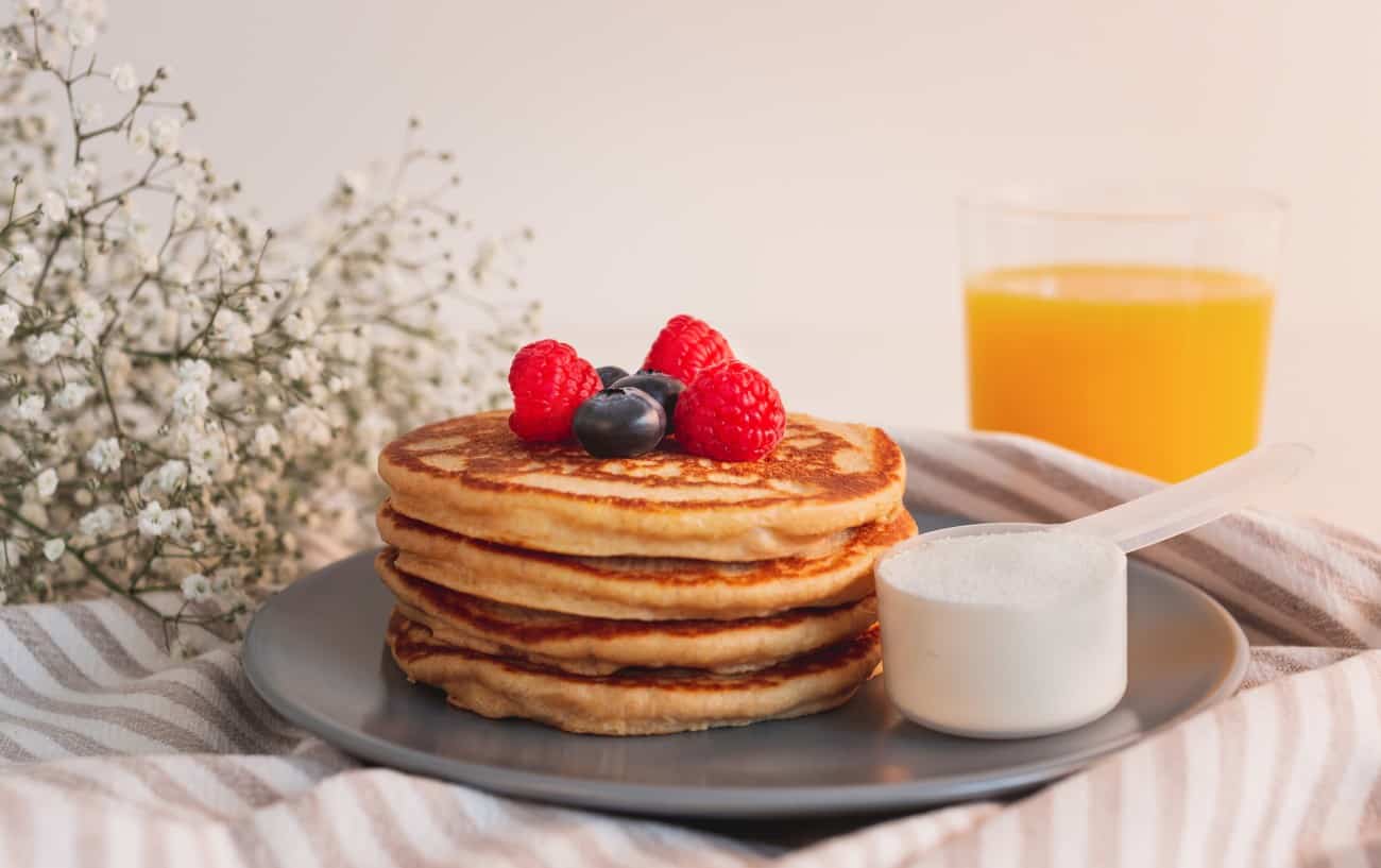 Protein pancakes and a scoop of protein powder.