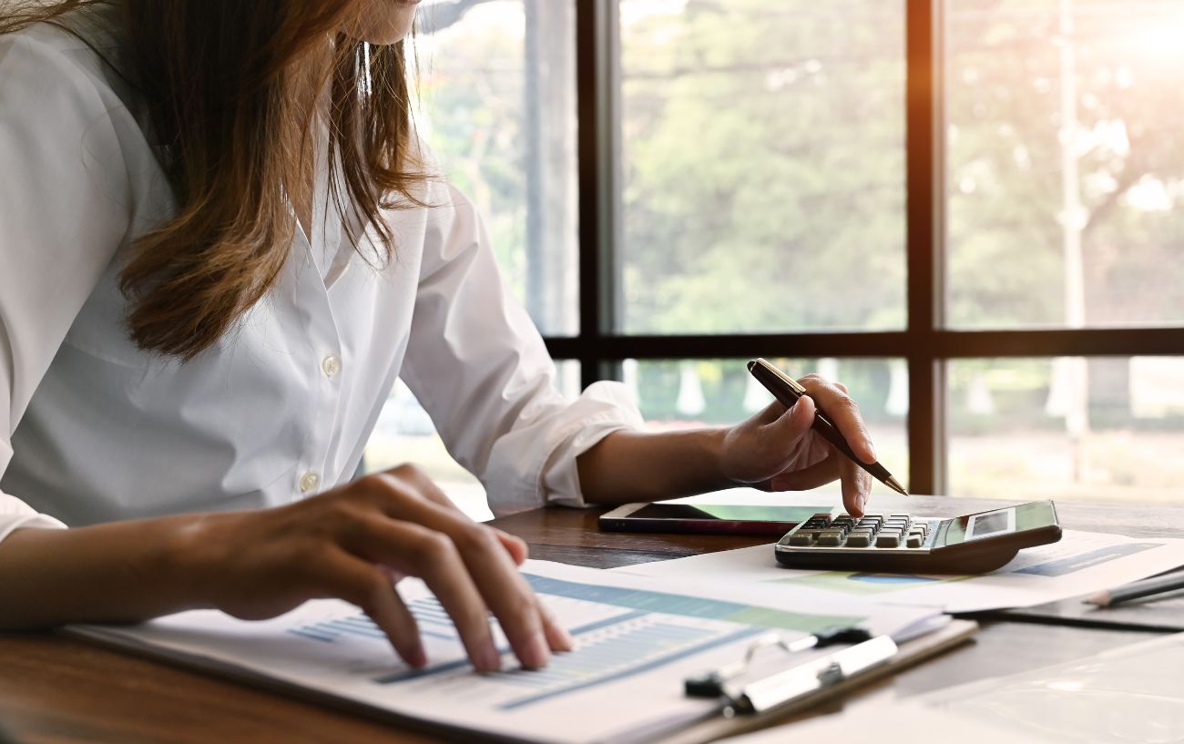 A person calculating.