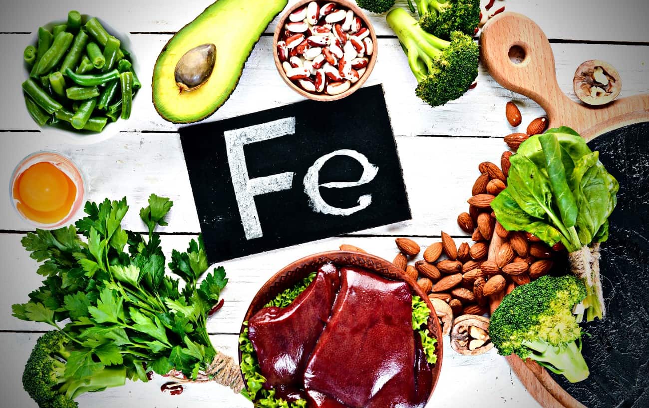 A variety of iron-rich foods such as avocado, greens, nuts, and meat.