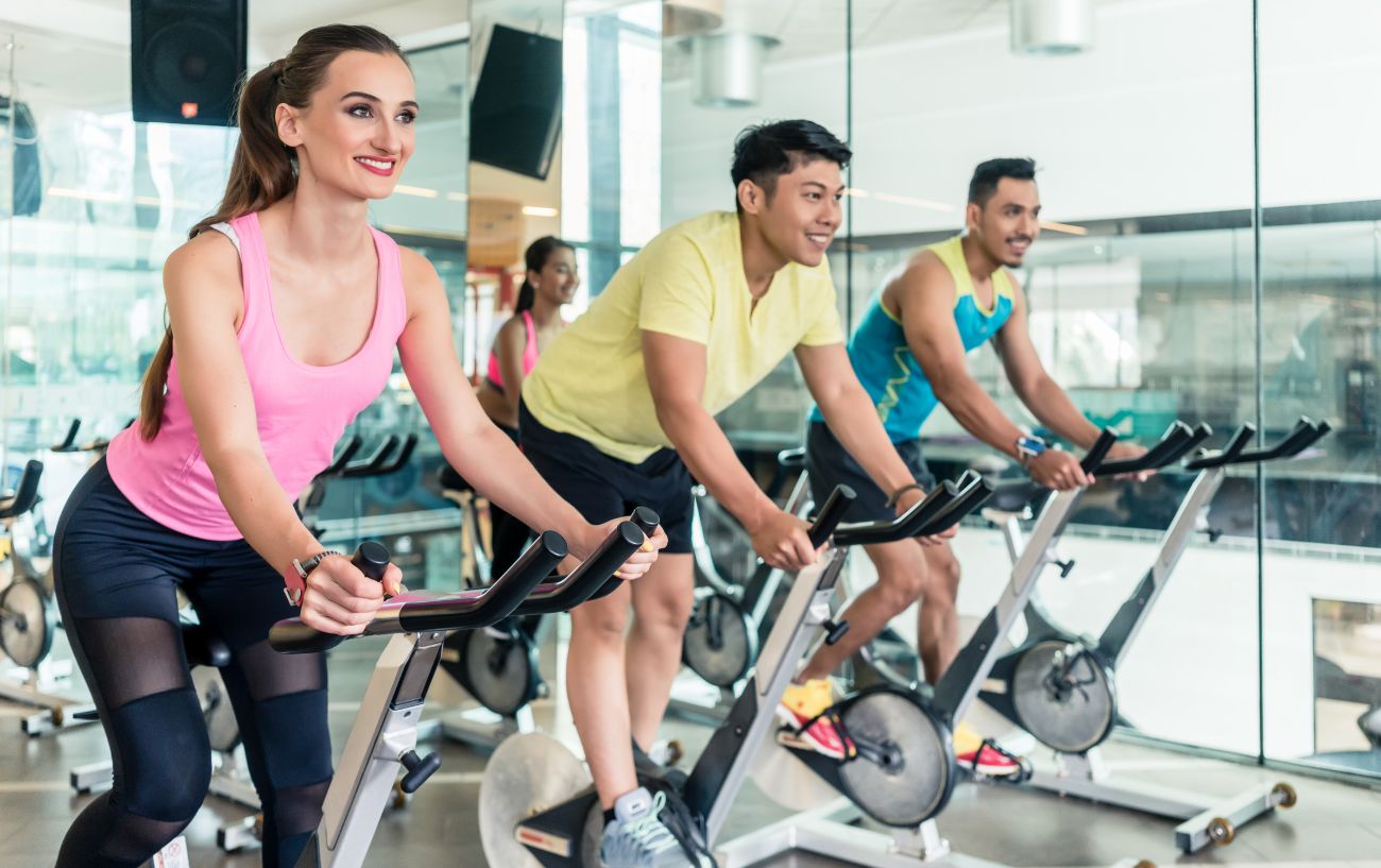 People on exercise bikes.