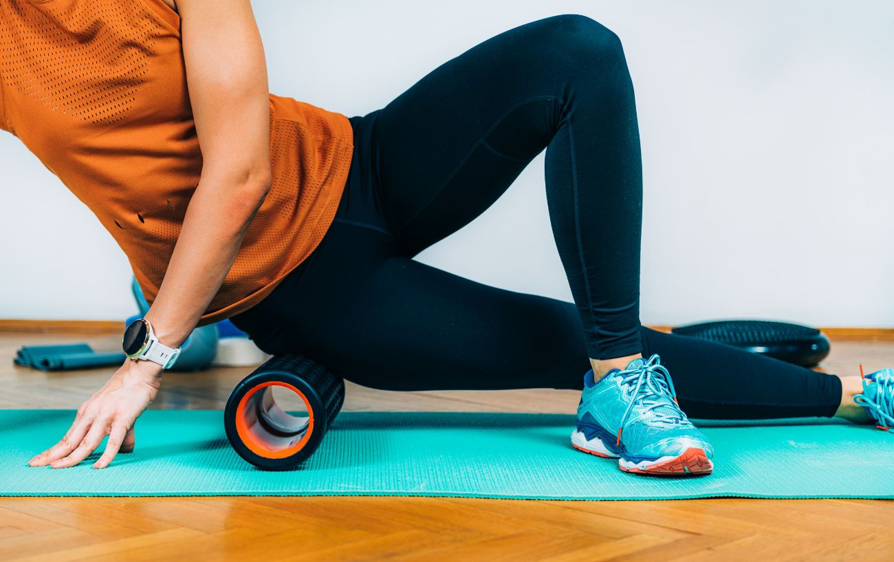 A person foam rolling.