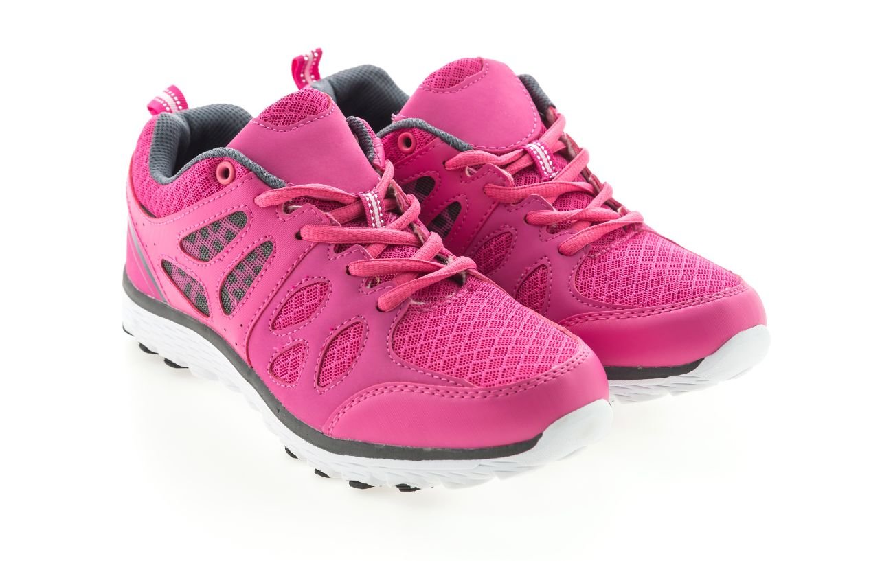 A pair of pink running shoes.