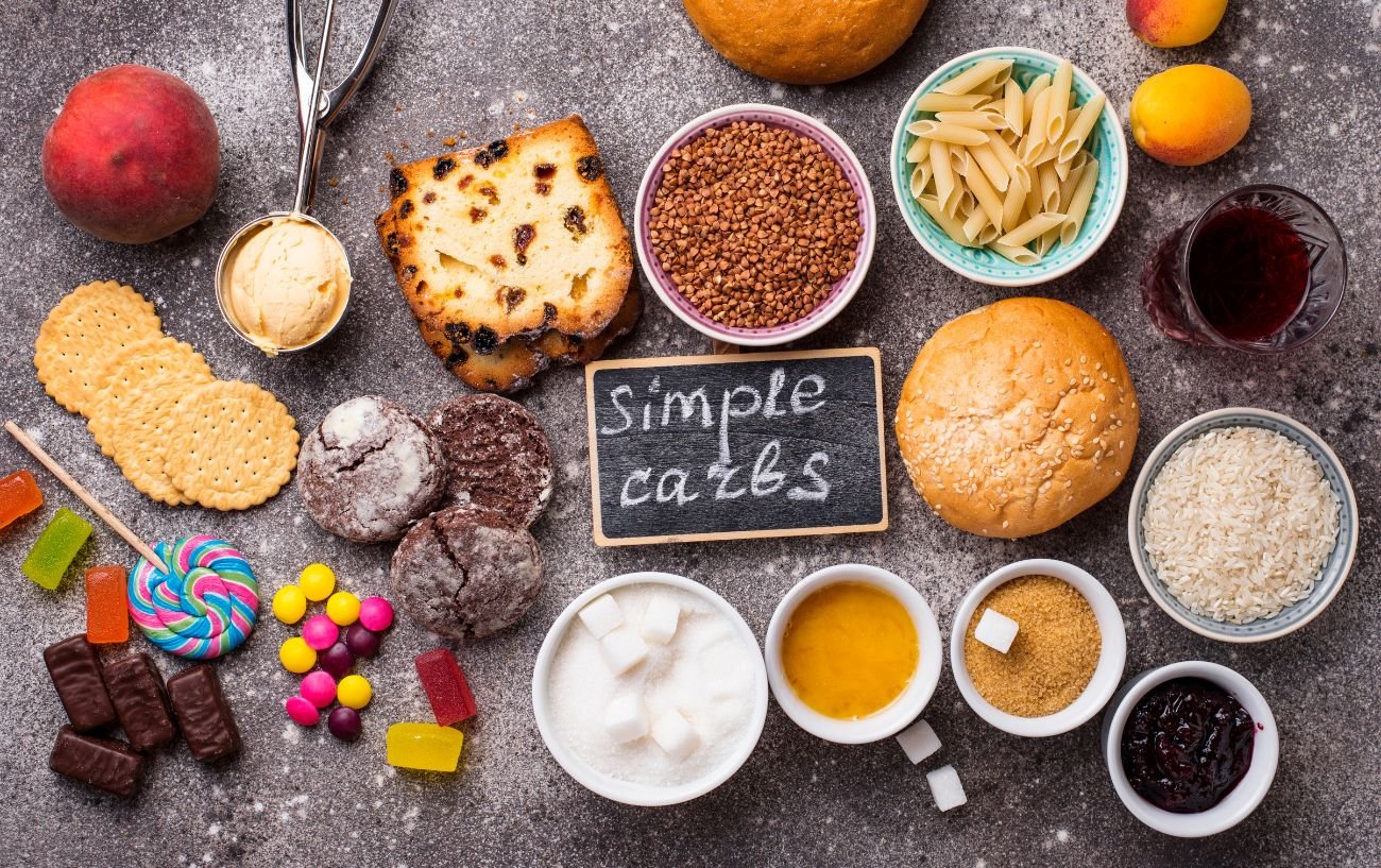 Examples of simple carbs for carb loading such as sugar, fruit, cookies, bread and garins.