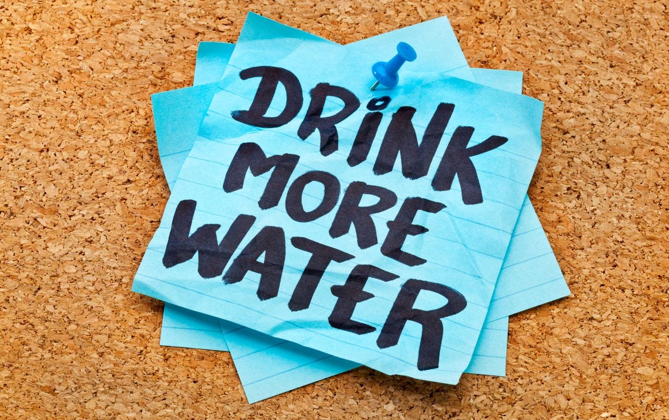 a blue note with black writing on it