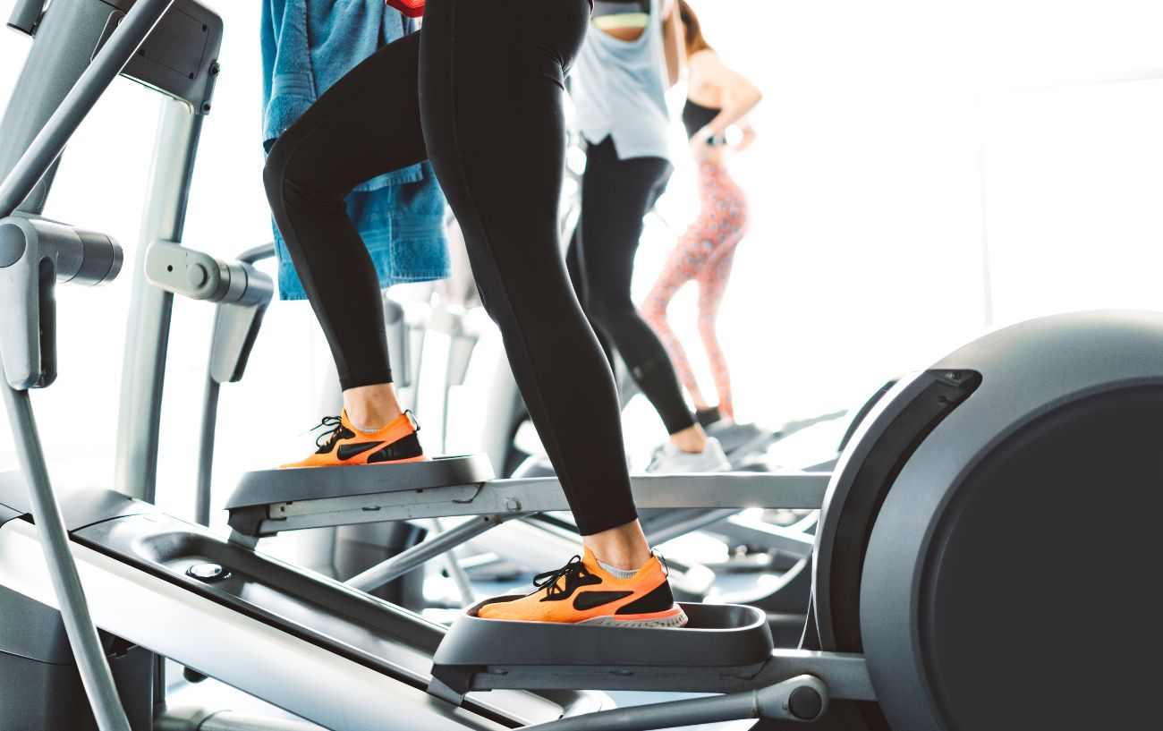 A person on an elliptical machine.